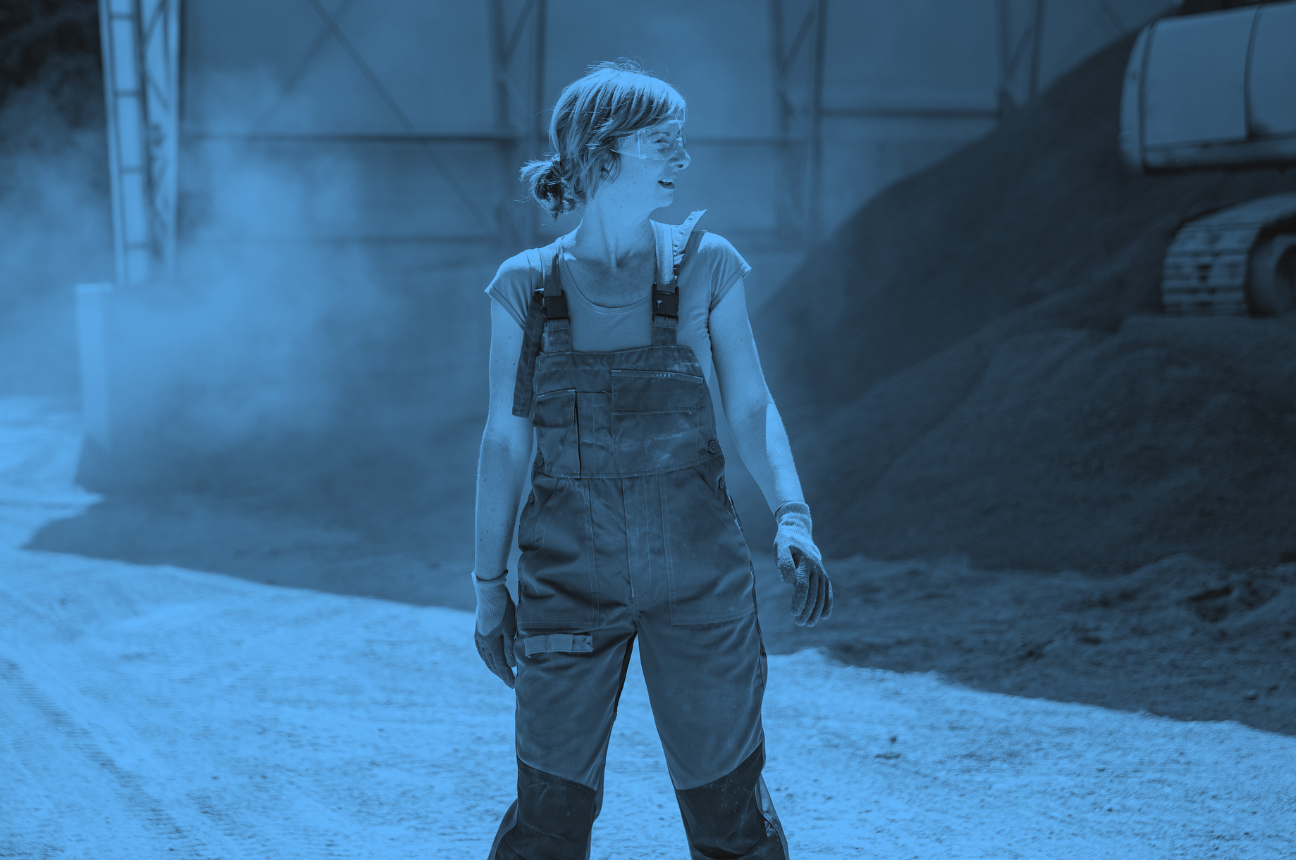 a young woman working at a construction site to represent the shift in Gen Z to blue collar work